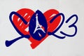 2023 logo with heart and Eiffel Tower in French colours.