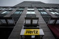 Logo of Hertz on their main office for Montreal, Quebec. Hertz is a car rental company from the USA spread worldwide Royalty Free Stock Photo