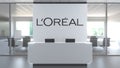 Logo of L'OREAL on a wall in the modern office, editorial conceptual 3D rendering Royalty Free Stock Photo