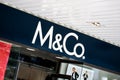 The logo of M&Co. fashion boutique which sells modern stylish clothing