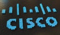 Plastic toy blocks compose logo of CISCO, editorial conceptual 3d rendering