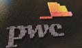 Toy bricks compose logo of PWC. Editorial conceptual 3d rendering