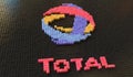 Toy bricks compose logo of TOTAL. Editorial conceptual 3d rendering