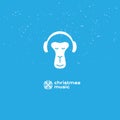 Monkey enjoys the Christmas music. Relaxing monkey in headphones. Logo for music studio