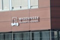 Logo and name of the wageningen university and research on building in Bleiswijk for testing growing lights