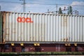 Logo of OOCL Containers on a container on a freight train.