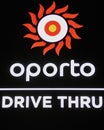 The logo at an Oporto drive thru restaurant Royalty Free Stock Photo