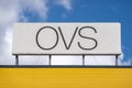 The logo of the Oviesse OVS fashion store at nice sunny day which sells clothing and other accessories