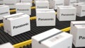 Logo of Panasonic on the white boxes on the conveyor. Editorial 3D rendering