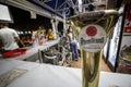 Logo of Pilsner Urquell Beer on a summer outdoor bar. Also known as Plzensky Prazdroj, it is a Czech lager beer Royalty Free Stock Photo