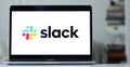 Logo of Slack displayed on the screen of a laptop