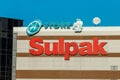 The logo of Sulpak and A Store on the building of a shopping and entertainment center in Kazakhstan