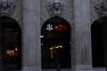 Logo of a Swiss bank UBS on facade of a historical building in red and white colors in city center of Zurich.