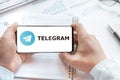 Logo of Telegram group chatting application, page in mobile phone. Social net, media resource, platfom, app to talk, chat, voice,