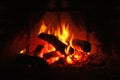 Logs burning in fireplace Royalty Free Stock Photo