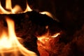 Logs burning with flames in a fireplace Royalty Free Stock Photo