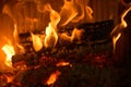 Logs burning in the hearth of a fireplace Royalty Free Stock Photo