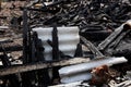 Logs from a burnt house, place after a fire Royalty Free Stock Photo