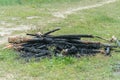 Logs, coal and ash left over from an extinct fire. Royalty Free Stock Photo