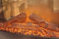 The logs of the fireplace burn with a bright fire Royalty Free Stock Photo