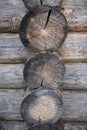 Logs of an old wooden house. House of timber, logs close-up. Royalty Free Stock Photo