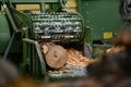 Making pine logs into woodchip