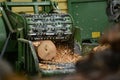 Making pine logs into woodchip