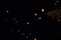 Loi Krathong and Yi Peng released paper lanterns on the sky during night Royalty Free Stock Photo