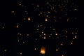 Loi Krathong and Yi Peng released paper lanterns on the sky during night Royalty Free Stock Photo