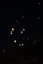 Loi Krathong and Yi Peng released paper lanterns on the sky during night Royalty Free Stock Photo