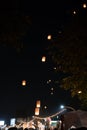 Loi Krathong and Yi Peng released paper lanterns on the sky during night Royalty Free Stock Photo