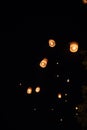 Loi Krathong and Yi Peng released paper lanterns on the sky during night Royalty Free Stock Photo