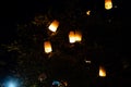 Loi Krathong and Yi Peng released paper lanterns on the sky during night Royalty Free Stock Photo
