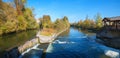 Loisach river and weir, autumnal landscape Wolfratshausen