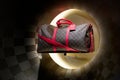 Loius Vuitton travel and leisure luggage duffle bag with red accent strap and handle Royalty Free Stock Photo