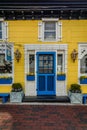 Loiusa\'s Cafe on Washington Mall, Cape May, NJ, is a cheerful sight with yellow and blue paint on a sunny spring afternoon