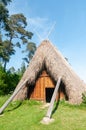 front of the hut Lojstahallen, Lojsta hall is a reconstructed Iron Age house near Lojsta on the Swedish island of Gotland. Europe Royalty Free Stock Photo