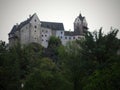 Loket is a castle located on a hill above the river OhÃâ¢e in the town of Loket, in the district Sokolov in the Czech Republic.