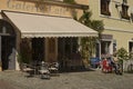 Galerie cafe with empty open-air tables and chairs.Travel and tourism concept