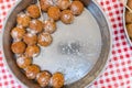 Lokma, Turkish street food dessert. Bites flavoured with honey, sugar syrup