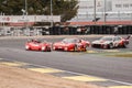 Lola T290 about to be dubbed by Ferrari 512 BB LM and BMW M1 in a classic car race at the Jarama circuit