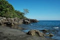 beautiful stunning tropical paradise shallow pacific ocean sea shore white sandy beach with rainforest jungle Royalty Free Stock Photo