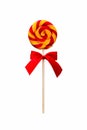 Lollipop candy, round shape and colorful curls. Holiday sweets for children on white background, isolate