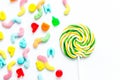 Lollipop design with sugar candys on white background top view m