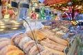 Lollipop donuts and cakes on a counter at the christmas market Royalty Free Stock Photo