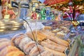 Lollipop donuts and cakes on a counter at the christmas market Royalty Free Stock Photo