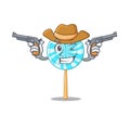 Lollipop dressed as a cowboy holding guns