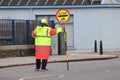 Lollipop Man at a Pedestrian Crossing