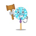 Lollipop in a mascot candy basket judge
