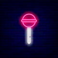 Lollipop neon icon. Pink sugar candy. Sweet bar emblem. Summer signboard. Shiny effect banner. Vector illustration